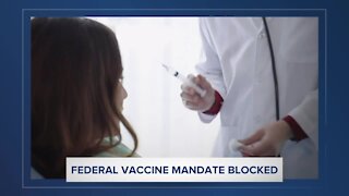 Judge blocks Biden's vaccine mandate for federal contractors