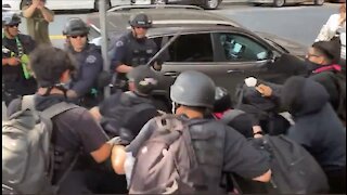 Police Beat Back Antifa After They Hurled Projectiles At Cops