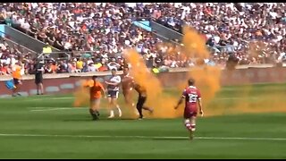 Climate Crazies Run On Rugby Field and Throw Orange Paint On Players