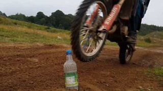 Bottle Cap Challenge executed on a motorcycle