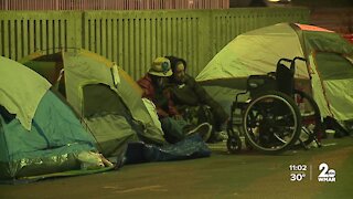 COVID and colder temps leave people in homeless encampment with little options