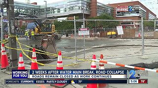 Two weeks after water main break, road collapse