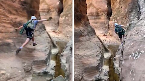 Daredevil incredibly parkours across desert canyon wall