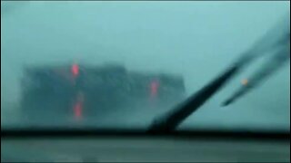 Truck blown over by storm in Iowa