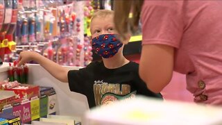Wyoming boy who saved his sister from dog attack gets candy shopping spree in Denver