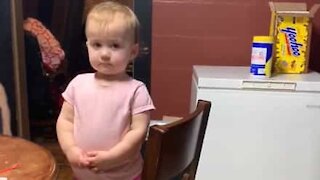 Indecisive baby doesn't know what she wants