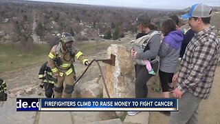 Firefighters climb to raise money for cancer treatment