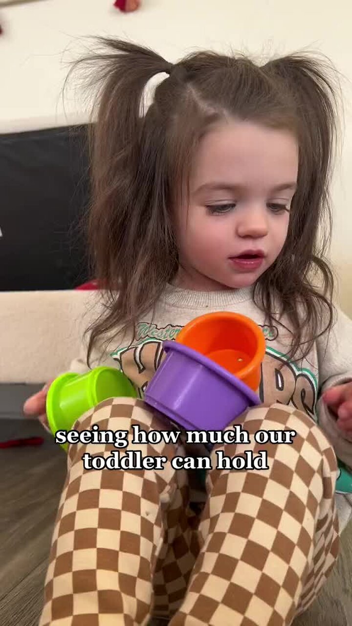 Dad is doing the, can you hold this challenge with his toddler daughter ...