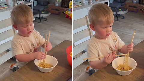 Funny Little Boy Is Determined To Eat Noodles With Chopsticks