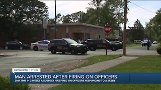 Man arrested after firing at officers