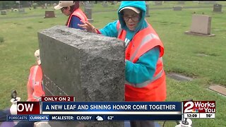 Women with disabilities clean veterans headstones
