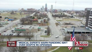 Medical experts warn pandemic isn't over despite re-openings