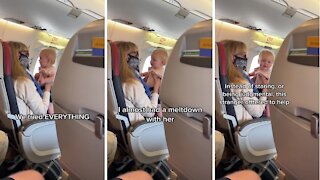 Stranger on airplane calms down crying baby