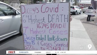 Protesting Gov. Ducey's visit to Tucson