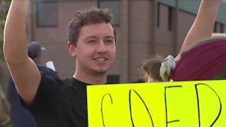 Dozens gather outside Akron Children's Hospital to protest its vaccine mandate