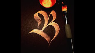 Calligraphy letter B with a brush