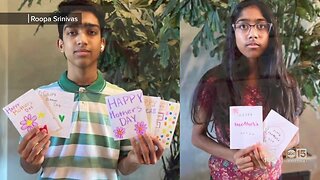 Teens making mother's day cards for memory care center