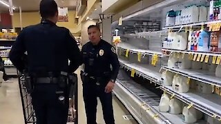 San Diego police officers help elderly man do his shopping