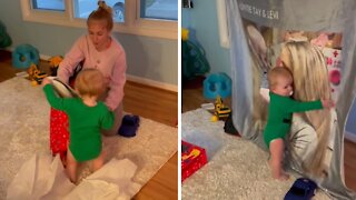 Baby has the sweetest reaction to gift blanket from auntie