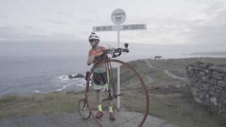 Fifty-five-year-old smashes world record on penny-farthing