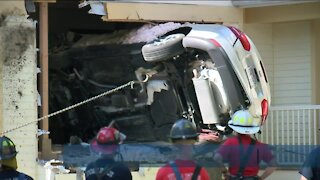 Person drives car into Wauwatosa home after losing control