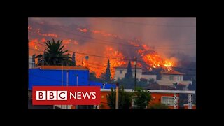 La Palma volcano engulfs village minutes after residents flee their homes - BBC News
