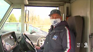 Mail carrier delivers message from Santa