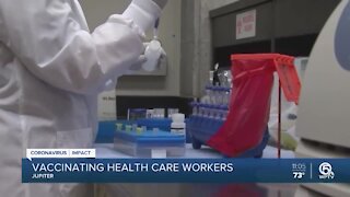 Jupiter Medical Center begins administering COVID-19 vaccine to health care workers