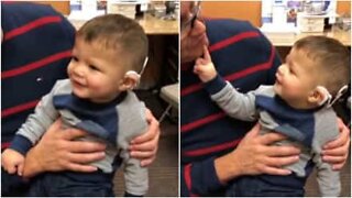 Child's emotional reaction to hearing for the first time