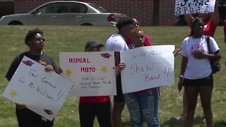 Shaw High School students, alum protest in response to band director's resignation