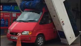 Van destroys automatic car wash