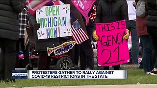 Protesters gather to rally against COVID-19 restrictions in Michigan