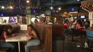 As restaurant dining rooms and bars open, caution reigns
