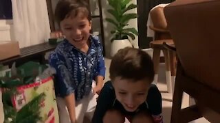 Kids surprised with new puppy for Christmas