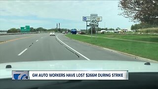 GM auto workers move into week three of strike