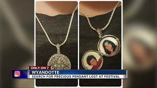 Woman loses precious pendant with pictures inside