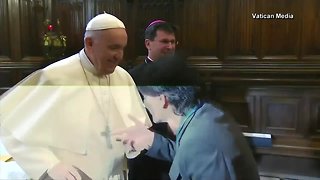 Pope Francis pulls hand away to avoid ring kissing