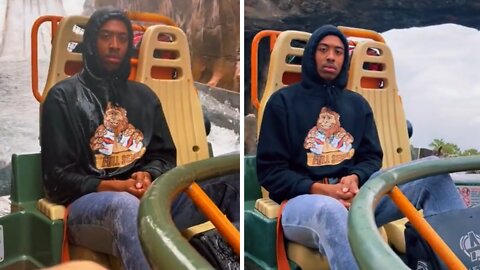 Dude is not happy about getting wet on water ride