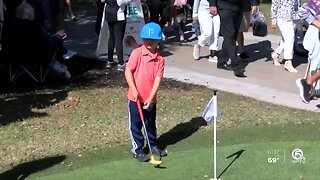 Young golfers enjoy Family Day at the Honda Classic