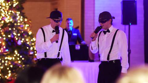 Brothers perform surprise rap toast for bride and groom