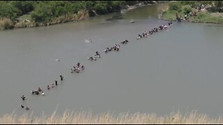 Huge Line Of Illegals Crossing Into Eagle Pass, Texas