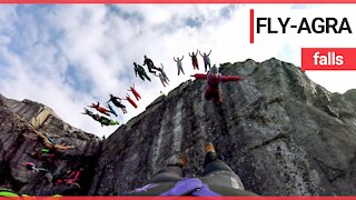 The mesmerising moment that a troop of BASE jumpers’ leap from a cliff