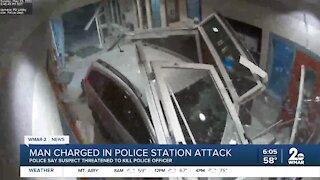 Man charged in police station attack