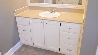 Update your bathroom vanity with Rust-Oleum countertop paint