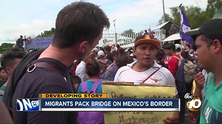 Migrants pack bridge on Mexico's border