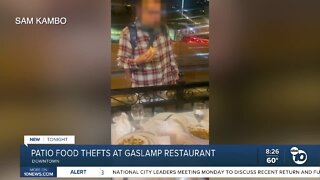Man grabs food from diners in Gaslamp restaurant patio