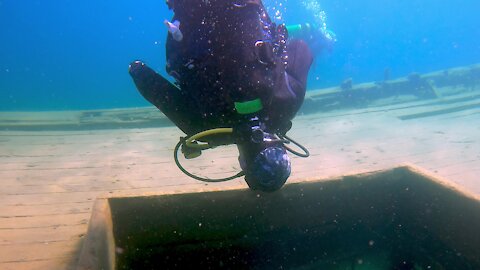 Scuba divers explore eerie & beautiful shipwrecks in the Great Lakes