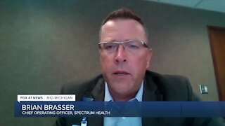 Brian Brasser who serves as Chief Operating Officer at Spectrum Health
