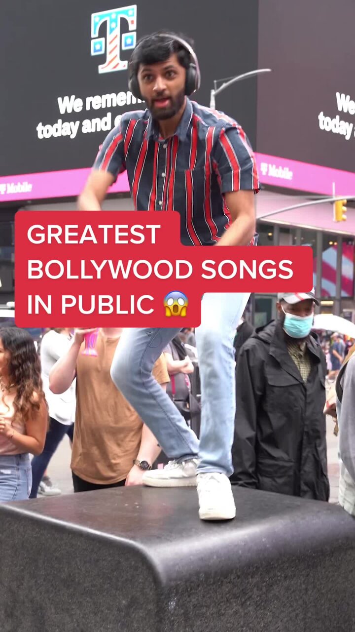 singing-bollywood-s-greatest-hit-song-in-times-square-mp4