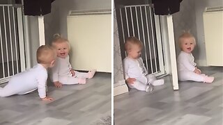 Giggling Twins Adorably Play Peek-a-boo With Each Other